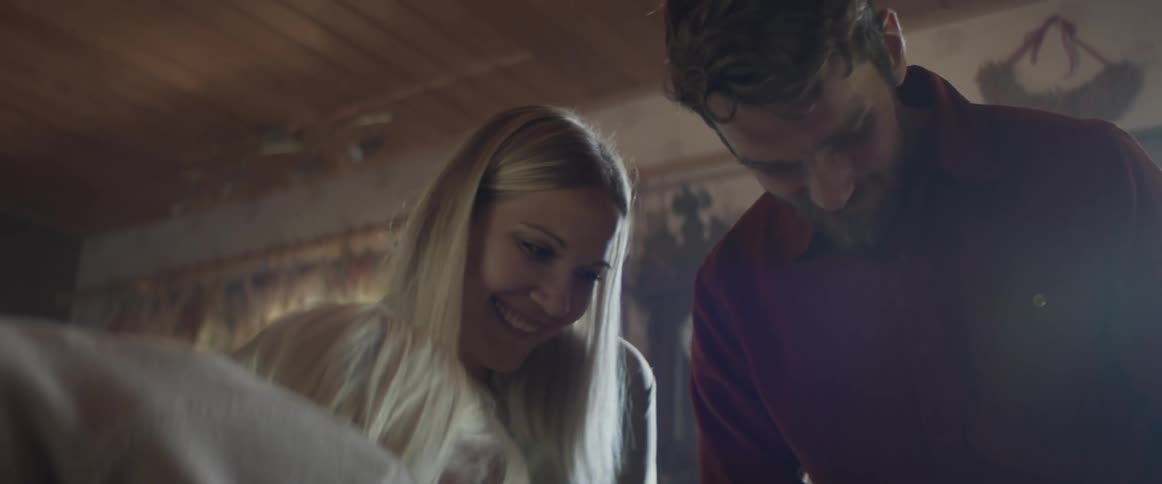Young couple visit mother in law at home