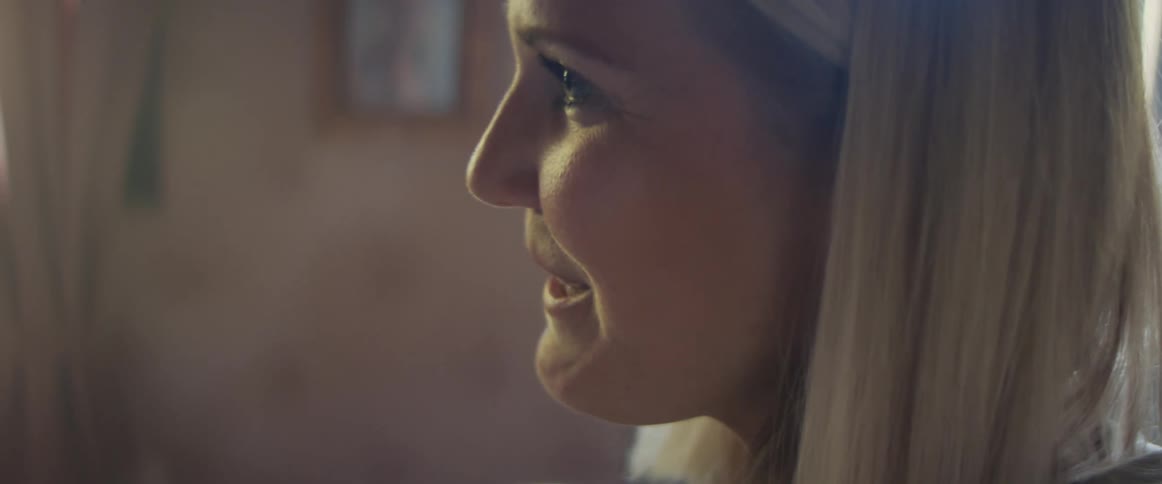 A woman is talking in a room