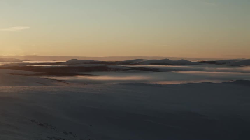 The mountains are covered in heavy snow
