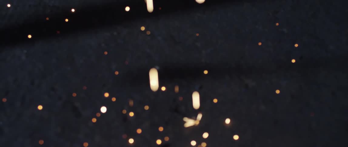 Sparks and embers falling onto the ground