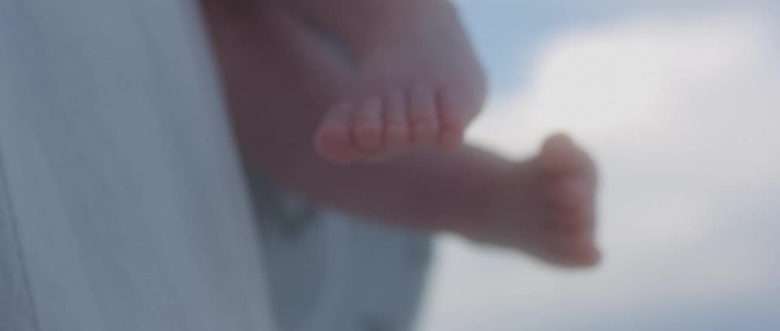 A babys feet outside