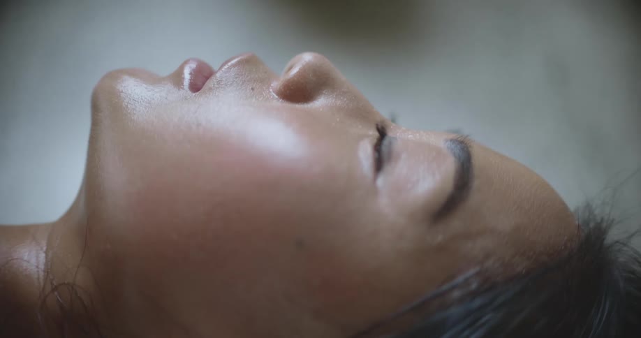 A woman laying on a floor