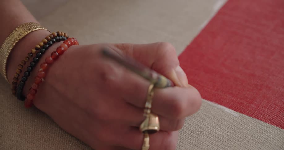 A woman painting on a canvas