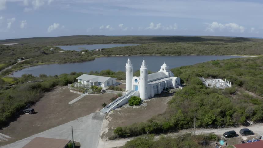 The twin towers and white of the church of st peter and st paul in the bahamas
