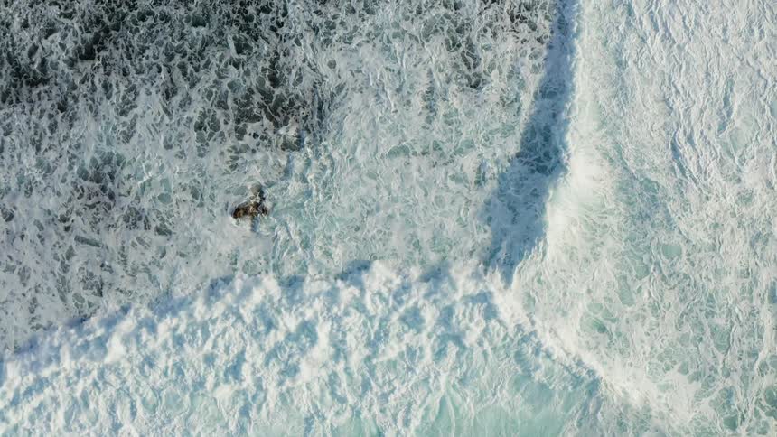A coast with waves and water