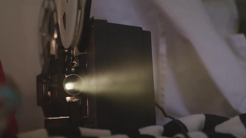 A close up of a vintage film projector
