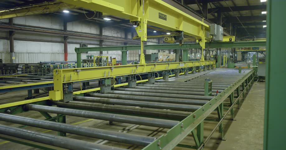 Factory with yellow metal arms and green metal bases