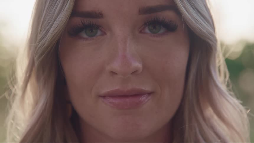 Close up of a womans face outdoors