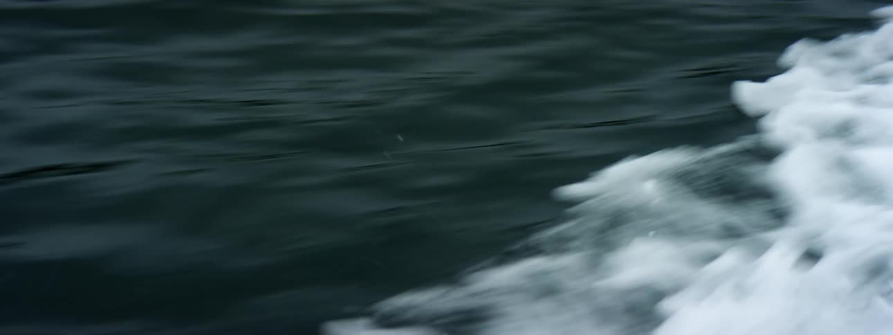White foam and splashing of a boat wake