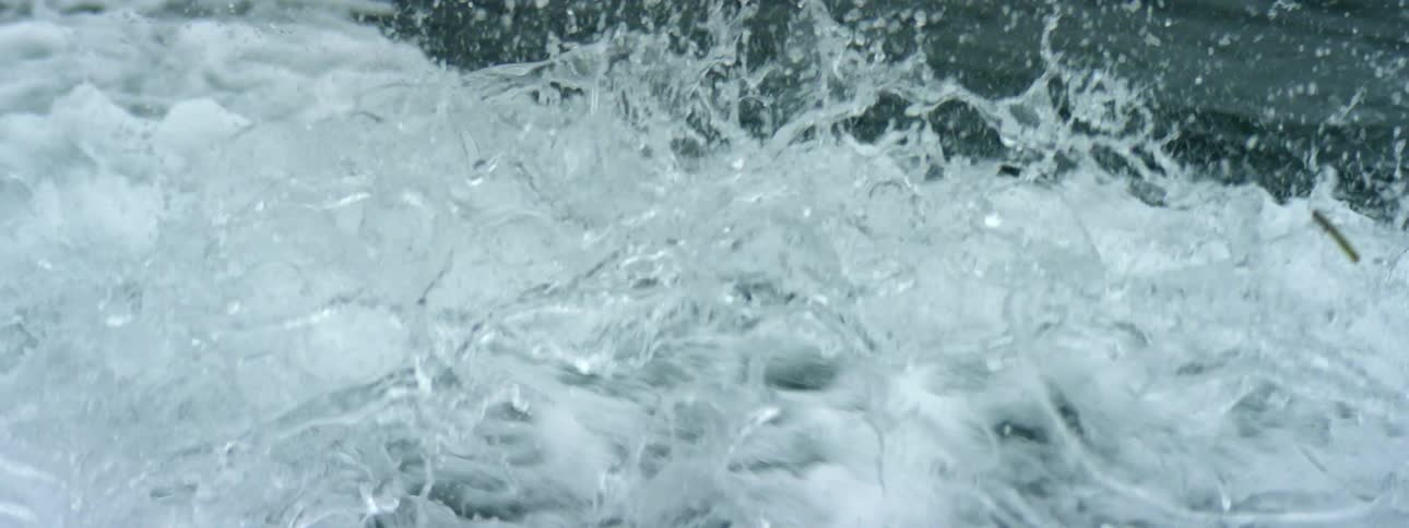 Waves splash in the ocean water