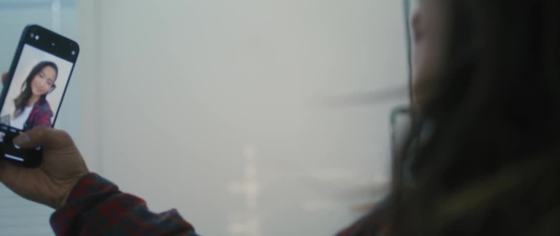 Teenager girl taking a selfie on her cellphone