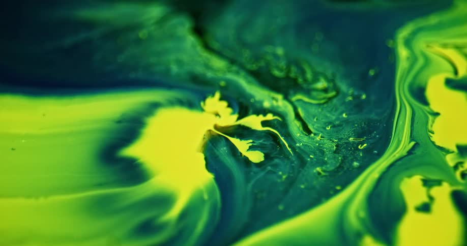 Green yellow and black colors that look like paint and water