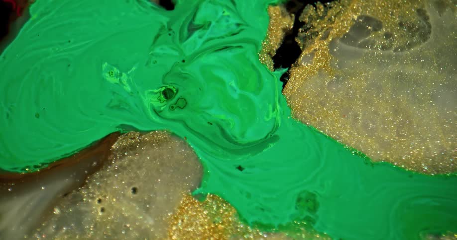 Green paint mixing with glitter