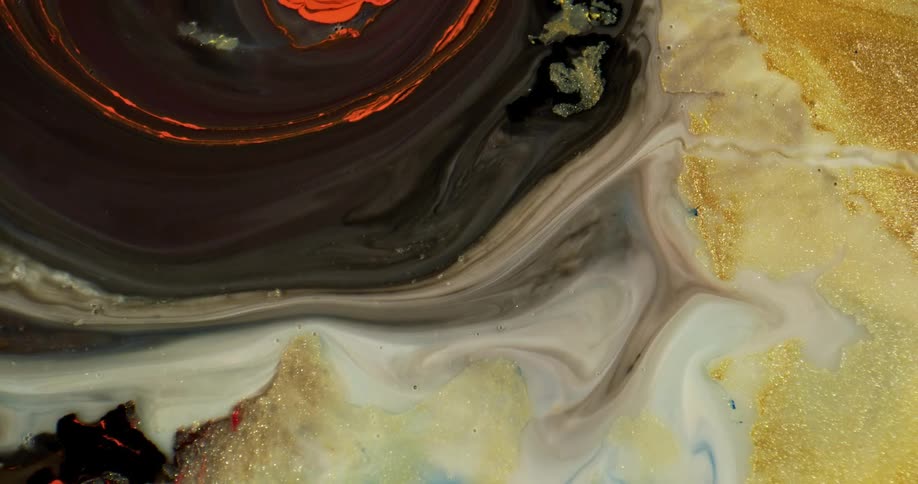 A close up of liquids mixing