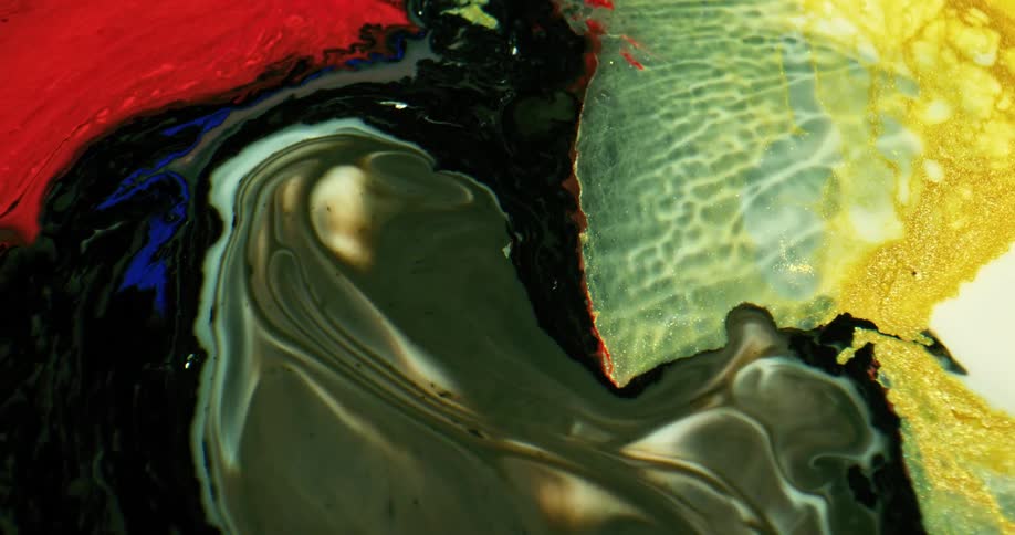 Green yellow black and red colors that look like paint and water