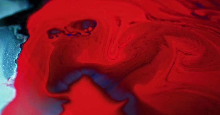 Black red and blue colors that look like paint and water