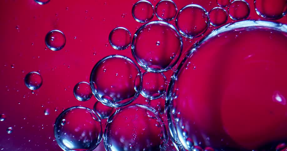 A close up of bubbles popping