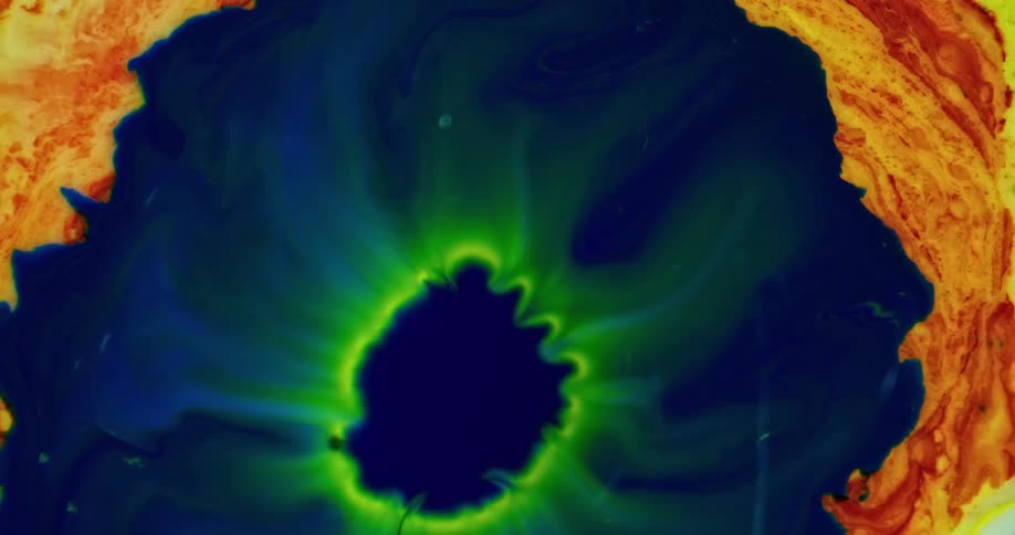 A close up of liquids mixing