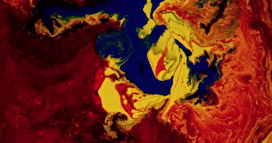 Red and yellow paint mix with royal blue paint and form a swirled pattern