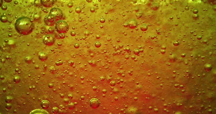 A close up of liquid with bubbles