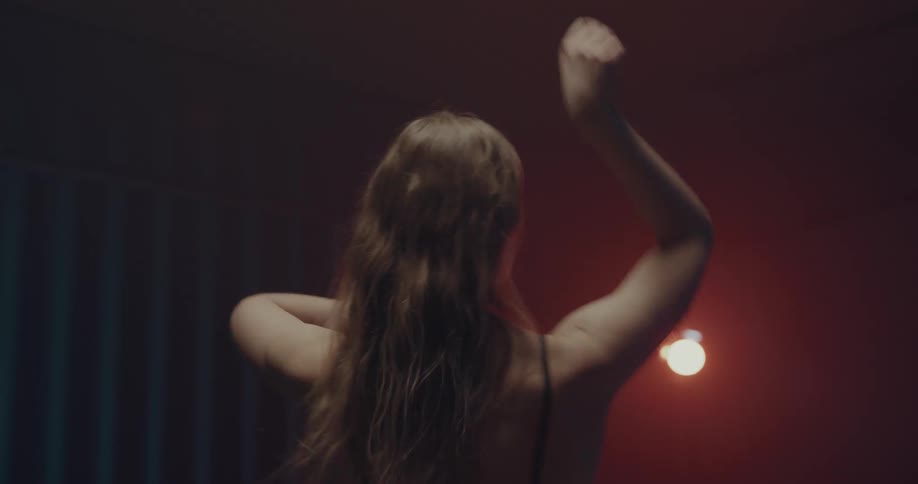 A young woman doing expressive dancing