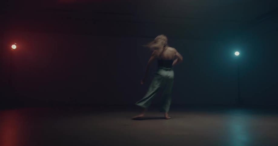 A woman dancing on a stage