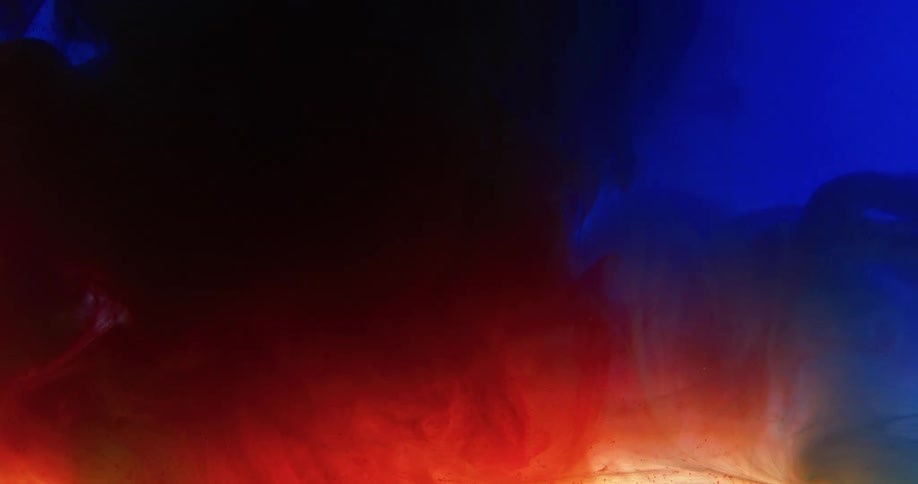 Abstract footage of liquid dye mixing together