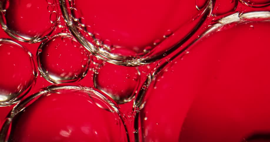 A close up of bubbles moving in liquid