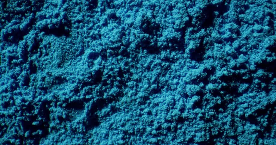 A close up of a teal ground