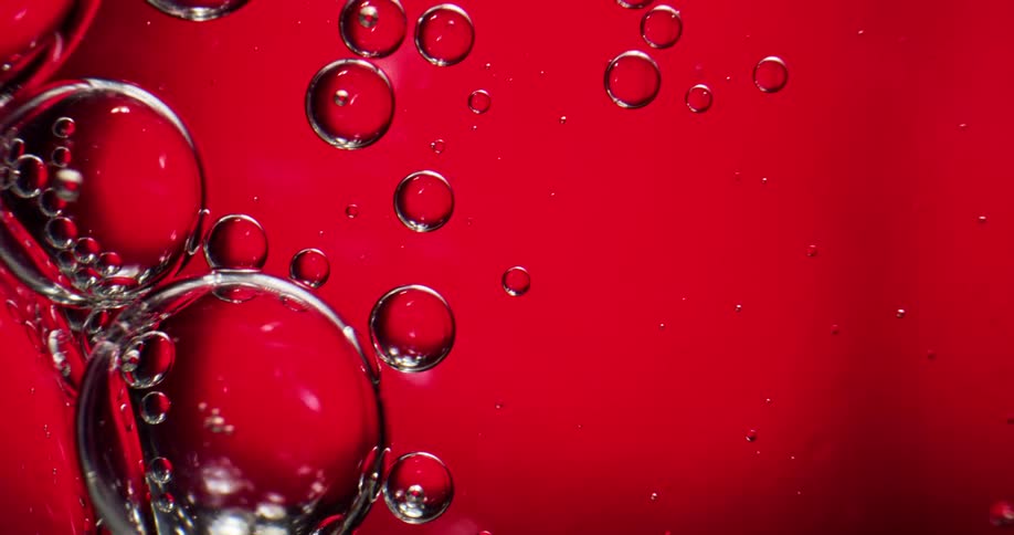 A close up of bubbles moving in a liquid