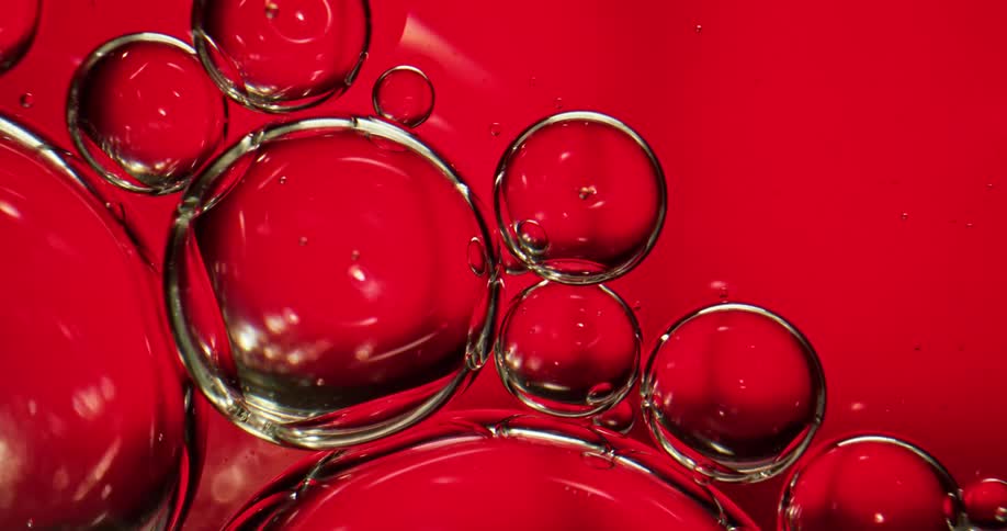 Groups of bubbles in liquid being moved around