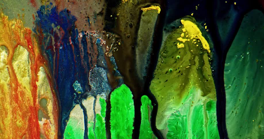 Liquid paints mixed together to make art