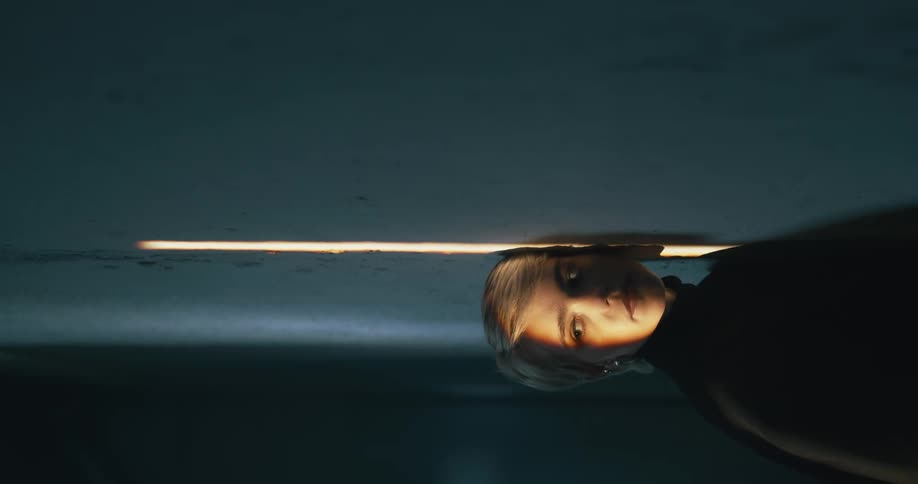 A woman laying on a floor