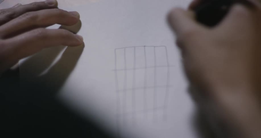 Someone drawing a graph