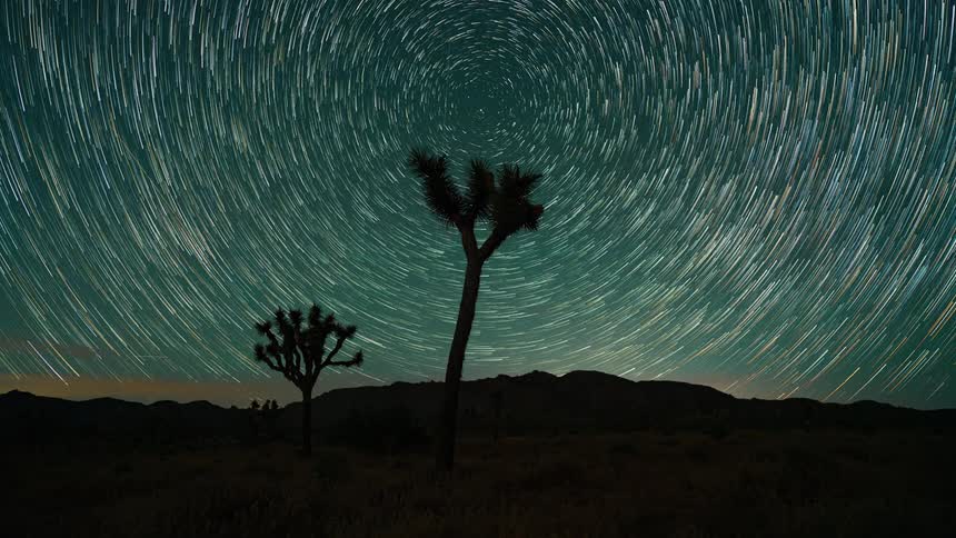 The stars blue and spin over the hill