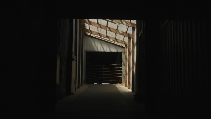 Light is shining from the roof of a garage