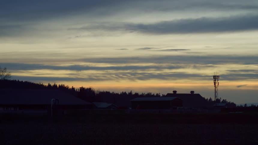 Landscape of sky with a structure at dusk