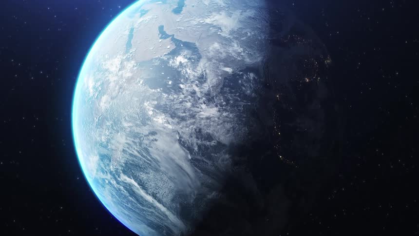 Planet Earth in space rotating as a shadow moves over the surface