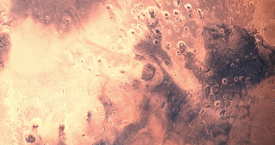 Craters and geographical features on the red surface of an alien planet