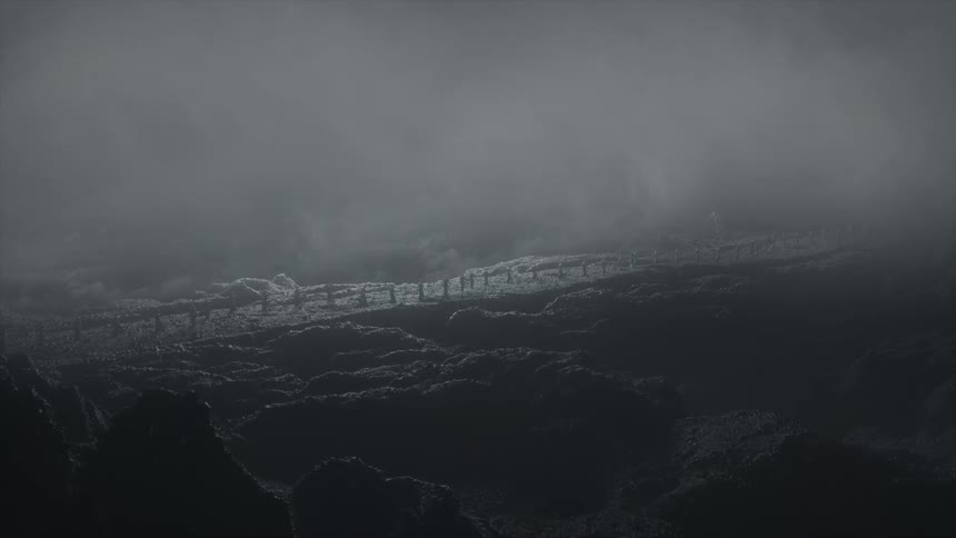 A landscape with rocks and fog