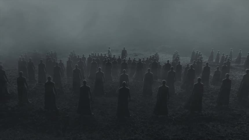 Dramatic zoom in of crowd and predominating central figure