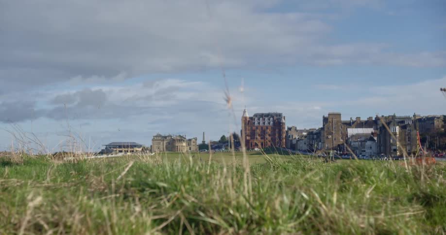Wide shot of a city looking from a rural area