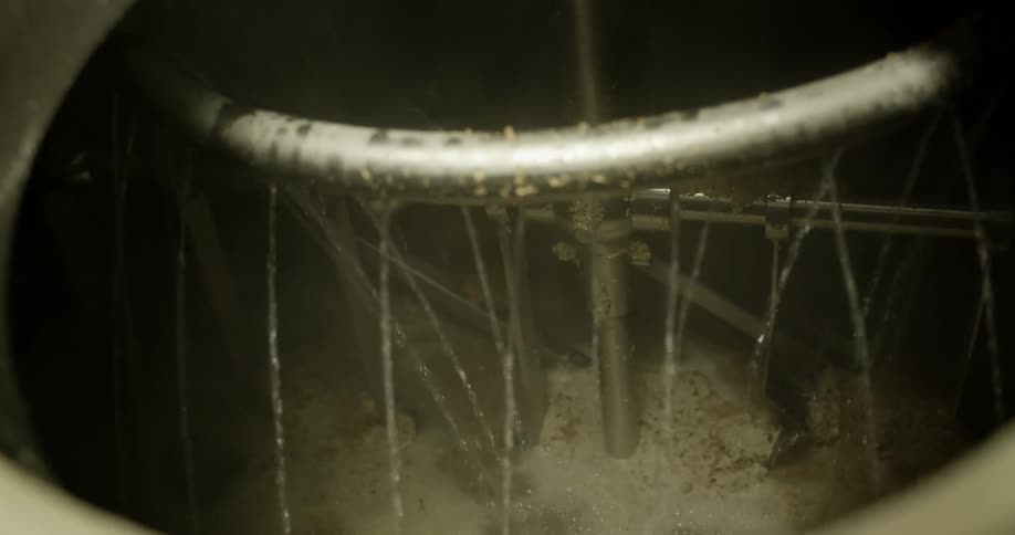 Interior of a working stainless steel brewery fermentation tank