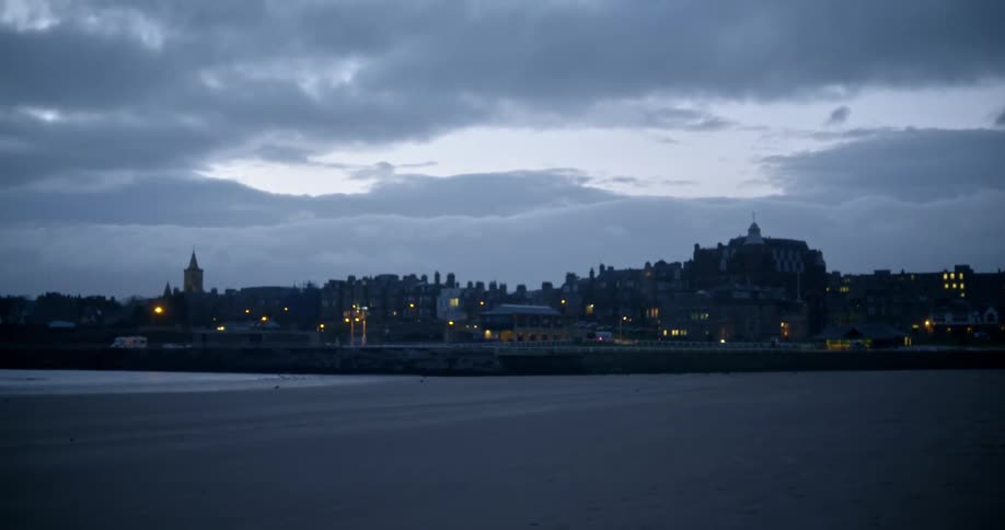 Skyline of a small town next to the beach at evening