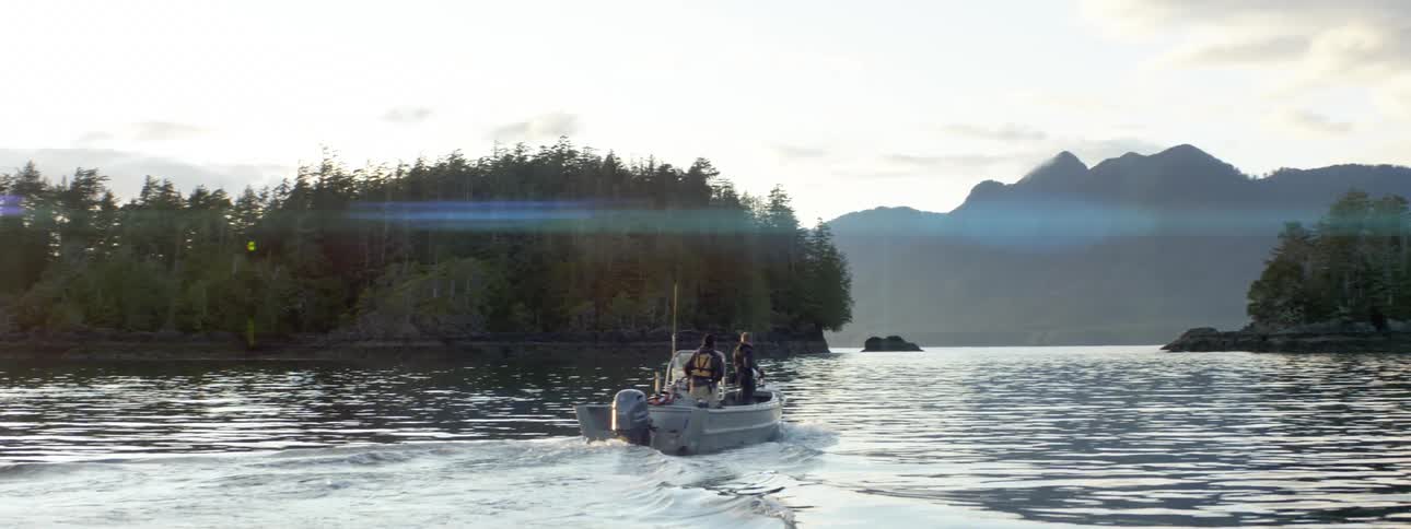 Wide shot of a boat on a lake