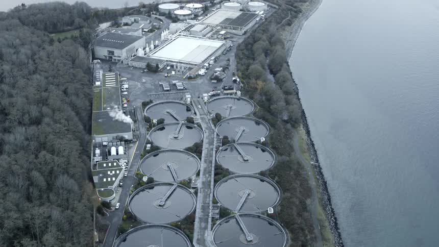 Multiple high capacity filtration tanks and support equipment at an oceanside sewage treatment facility
