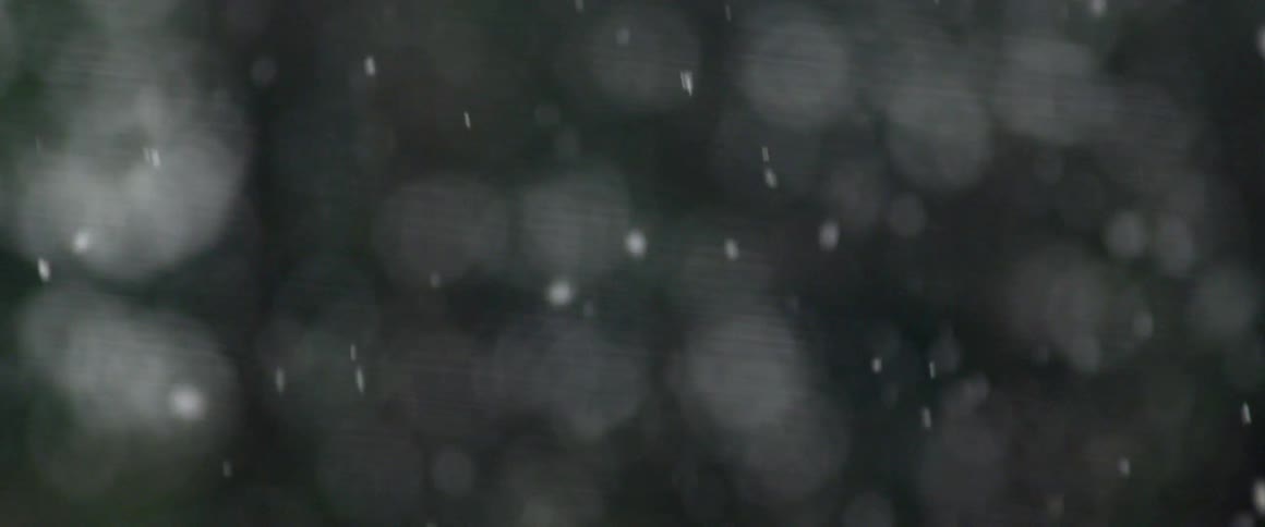 Black white and gray colors that look like snow falling