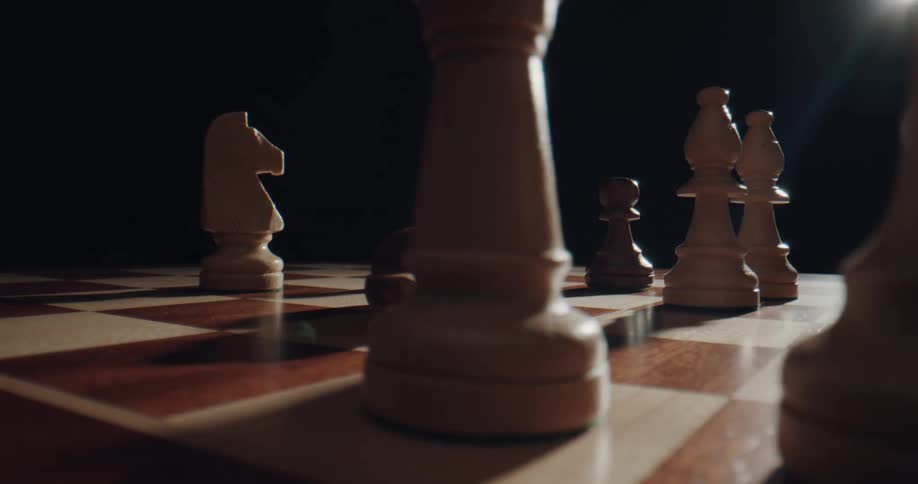 A person is playing a game of chess
