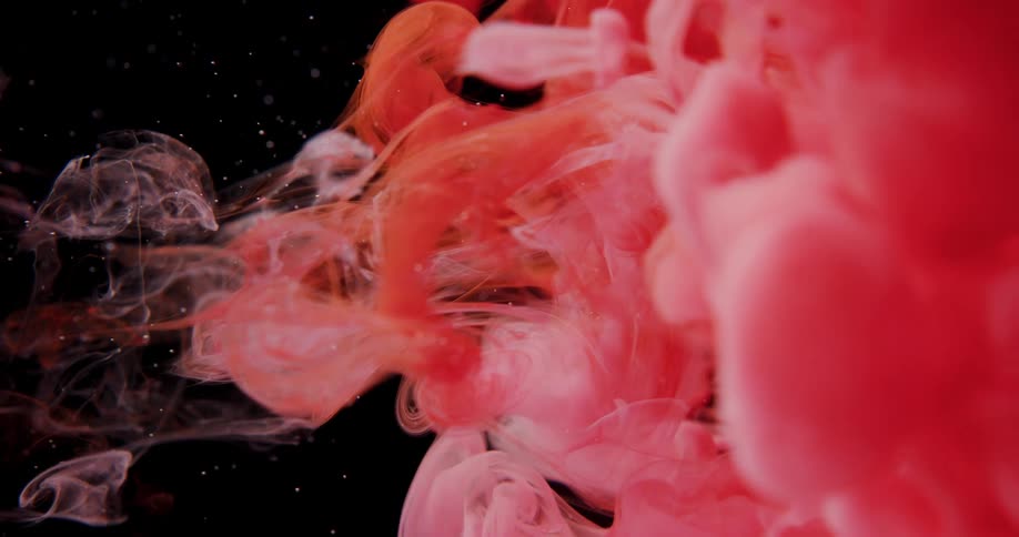 Red liquid flowing towards green flowers