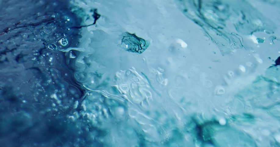 Water running under ice